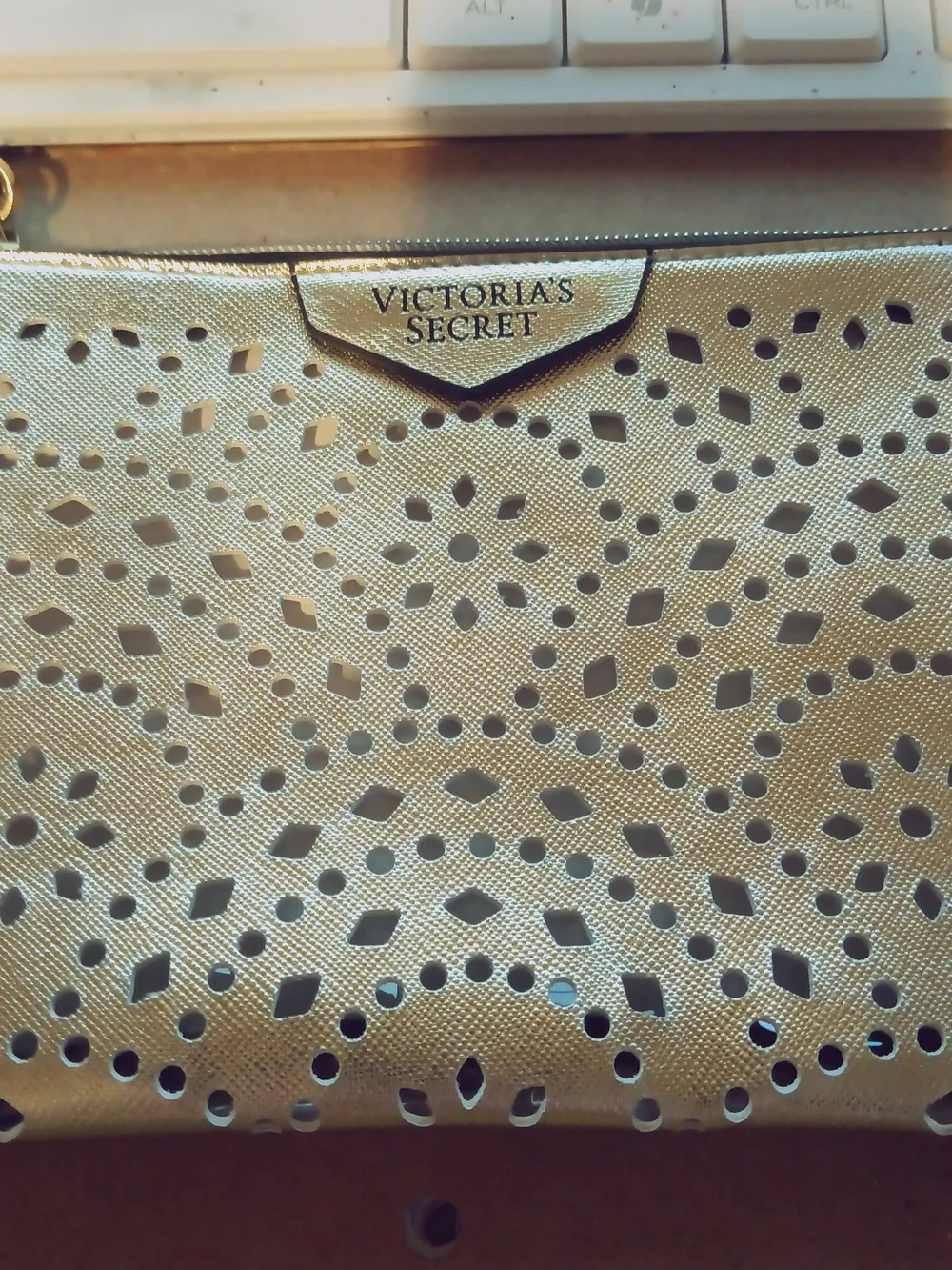 Victoria's Secret Gold Laser-Cut Wristlet Clutch